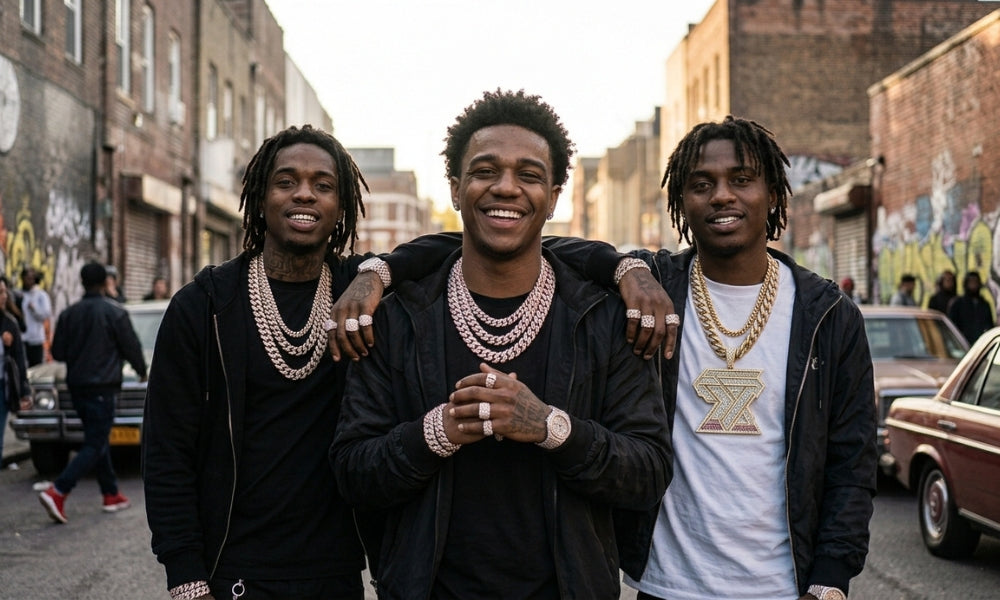 Three men with heavily iced Cuban link chains, diamond watches and a custom pendant standing on a New York street