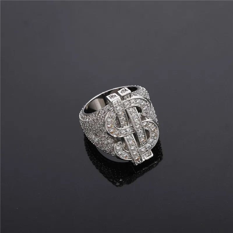 Iced Dollar Sign Ring - silver fully iced dollar sign ring, angled view on black reflective background