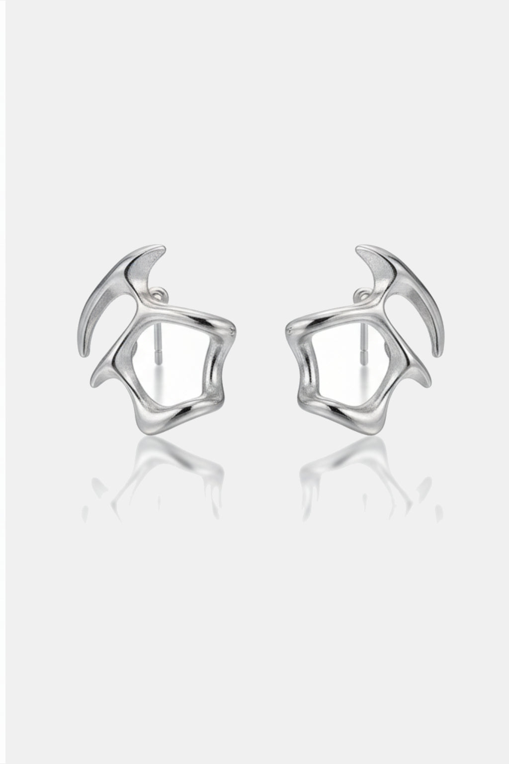Abstract Earring - silver sculptural curve earring, front view