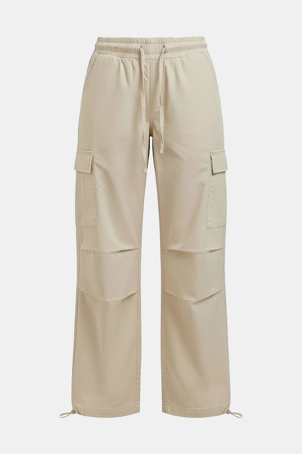 Beige Parachute Pants - beige parachute cargo pants with drawcord ankle cuffs, front view