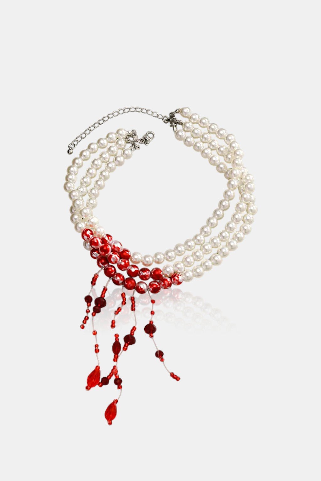 Blood Necklace - layered pearl necklace with red drip accents, front view