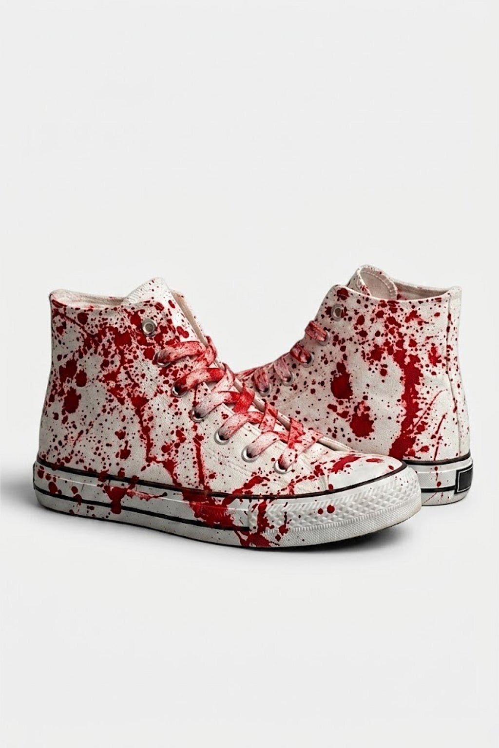 Blood Shoes - white high top sneakers with red splatter finish, front view