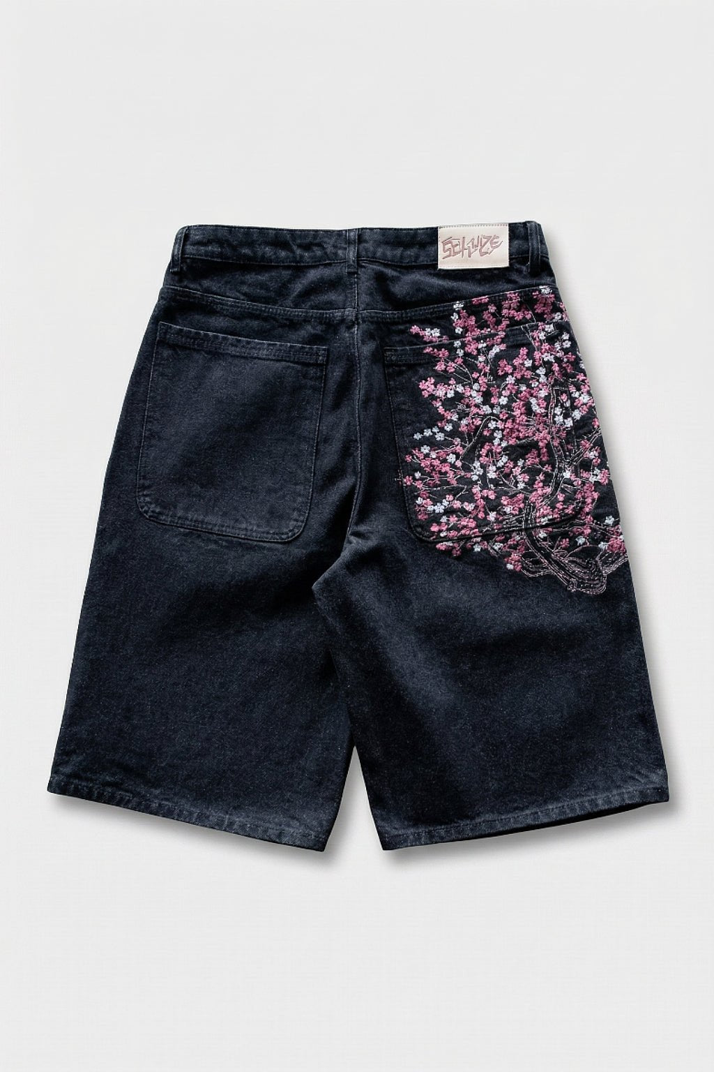 Cherry Blossom Shorts - dark denim shorts with cherry blossom print on back pocket, front view