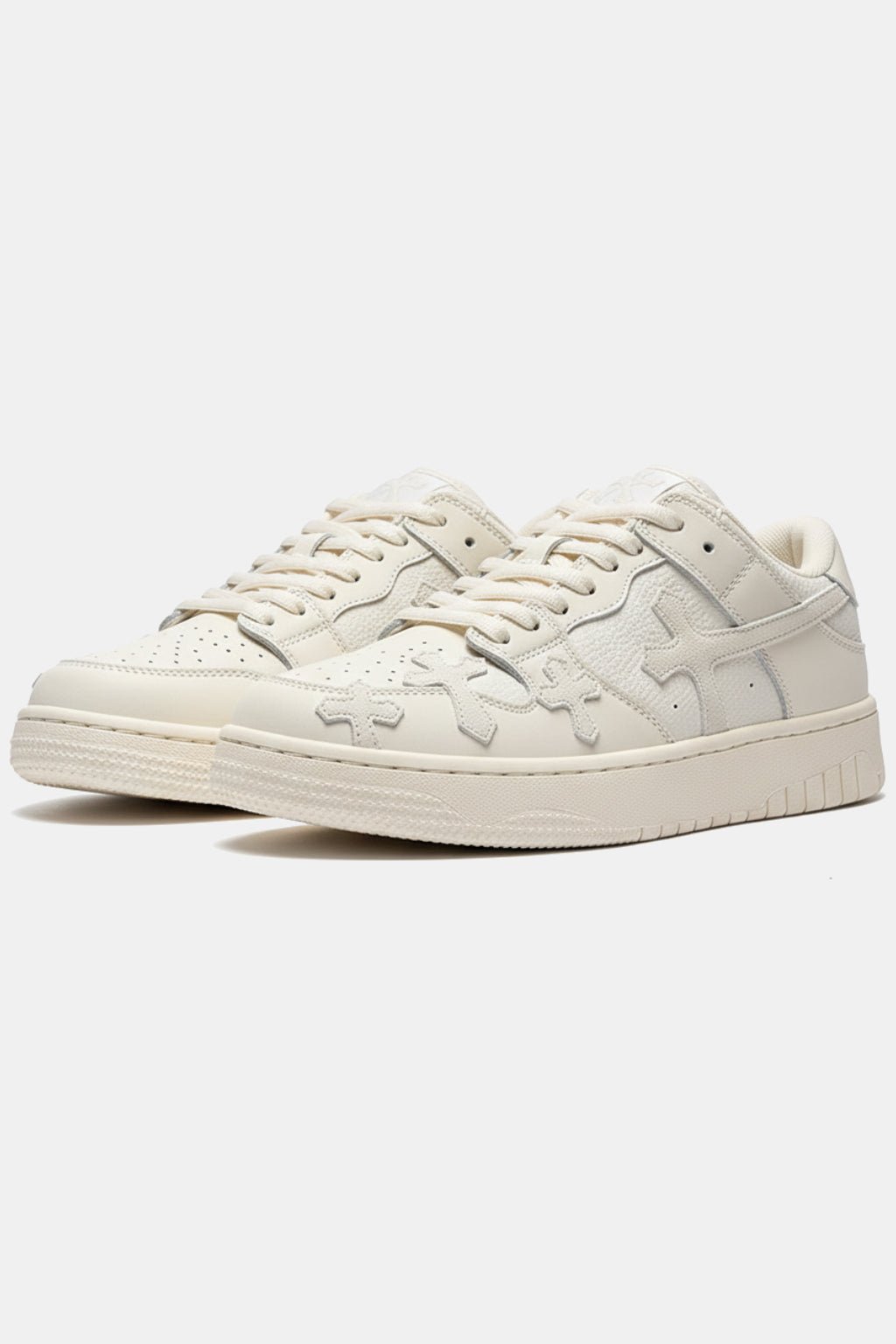 Cross Sneaker - white chunky sneakers with bold cross graphic, front view