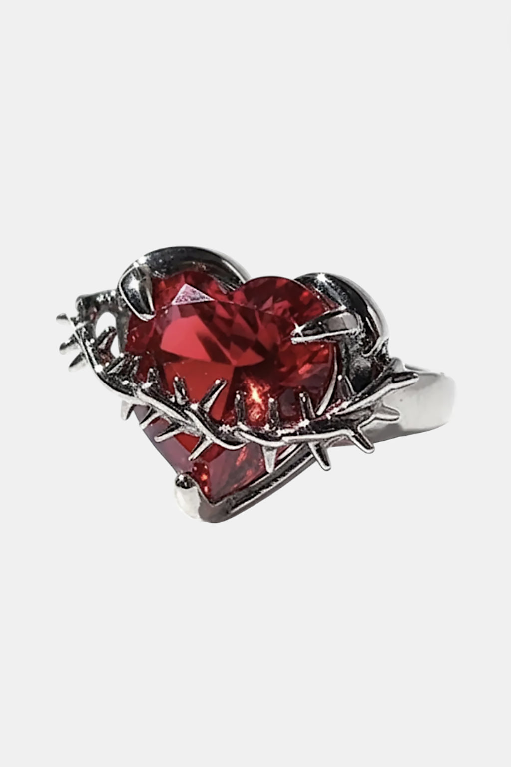 Gothic Ring - silver ring with thorn wrapped red heart stone, front view