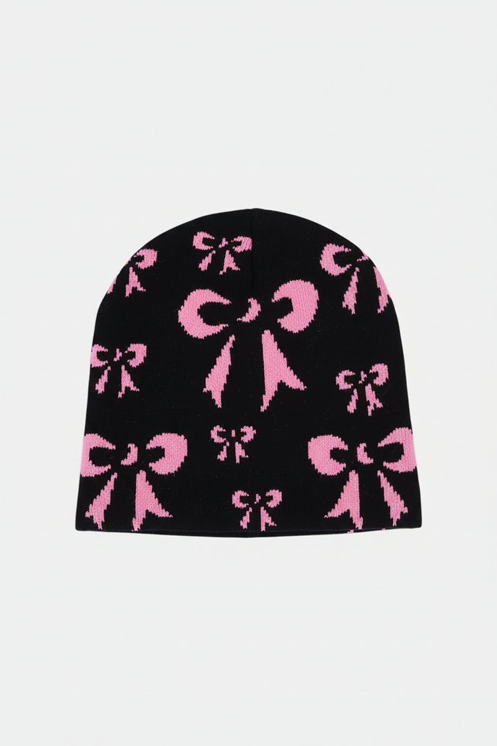 Knotted Beanie - black beanie with repeating pink bow pattern, front view