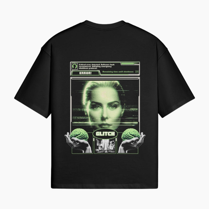 Pixel Art T-Shirt Error Protocol - black boxy tee with green static glitch portrait graphic, worn view