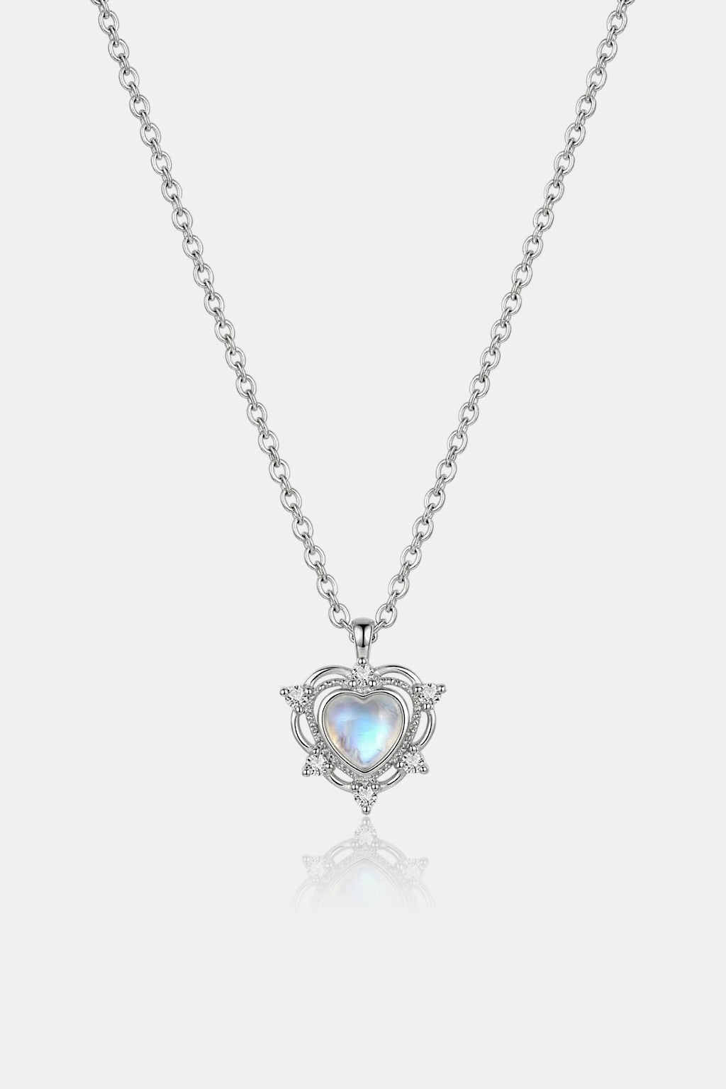 Planet Necklace - ornate pendant with shimmer blue stone centre, front view
