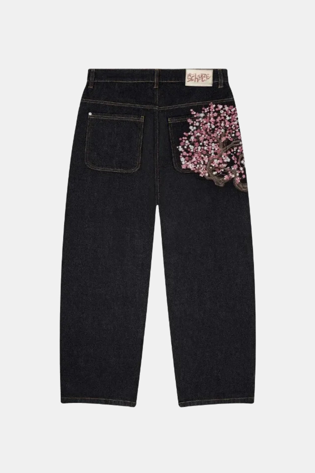 Printed Japanese Jeans - black jeans with embroidered blossom patch, front view