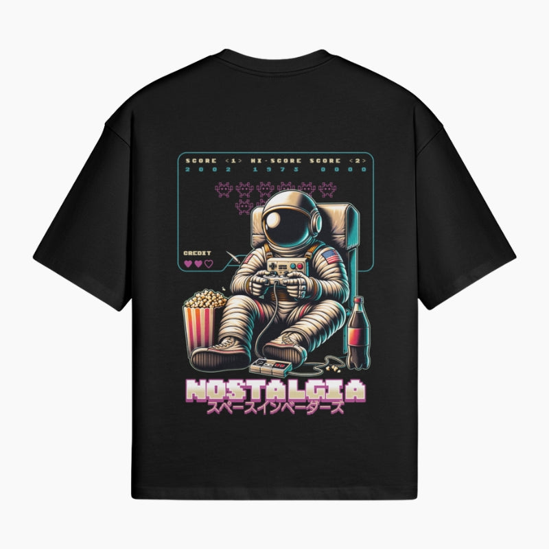 Retro-Gaming Y2K T-Shirt Nostalgia - black boxy tee with astronaut illustration and Nostalgia graphic, worn view