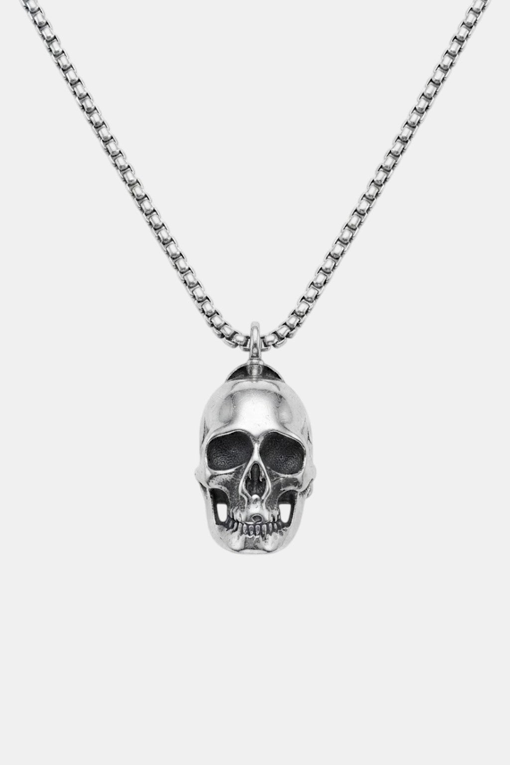 Skull Necklace - sculpted skull pendant on fine chain, front view