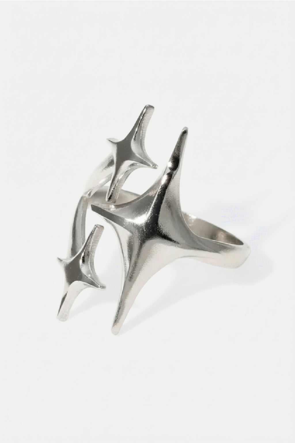 Star Ring - silver sculptural ring with radiating star points, front view