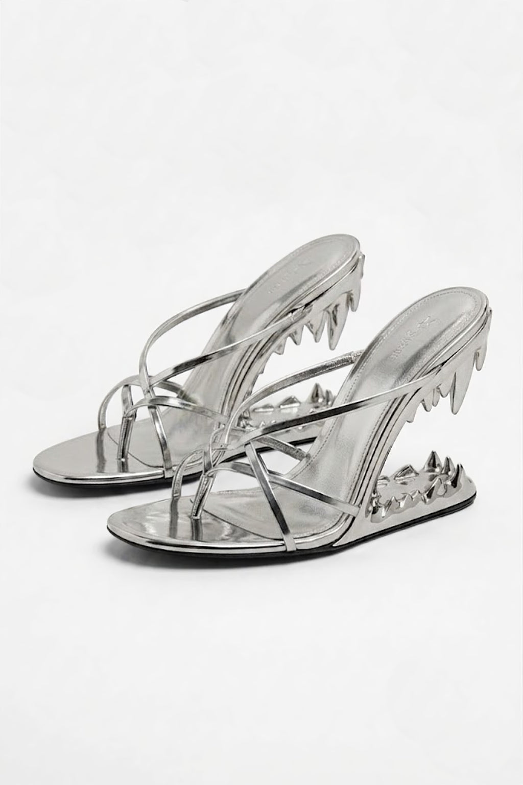Teeth Heel - metallic sandal with fanged tooth shaped heel, front view