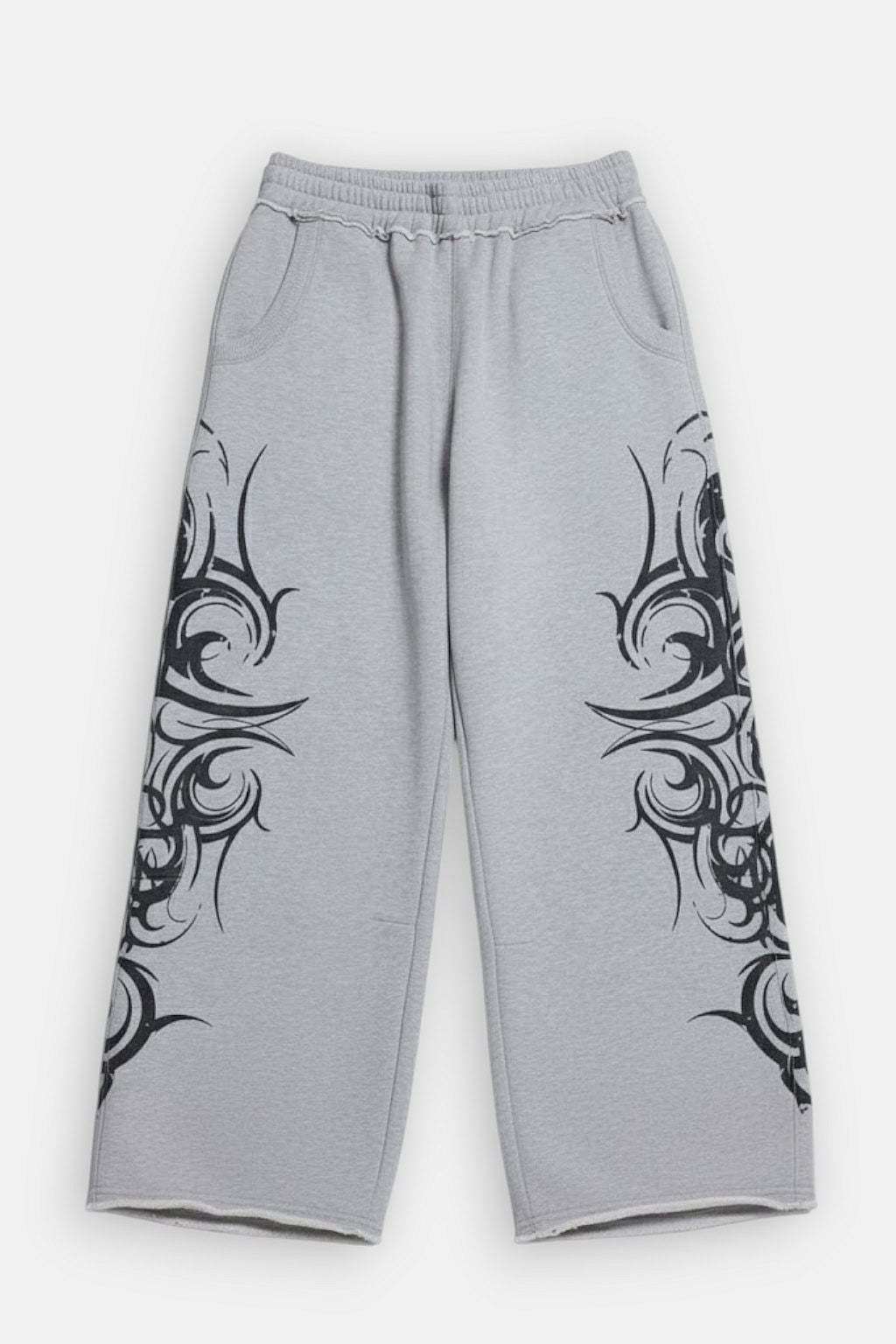 Tribal Joggers - grey wide leg joggers with tribal linework graphic, front view