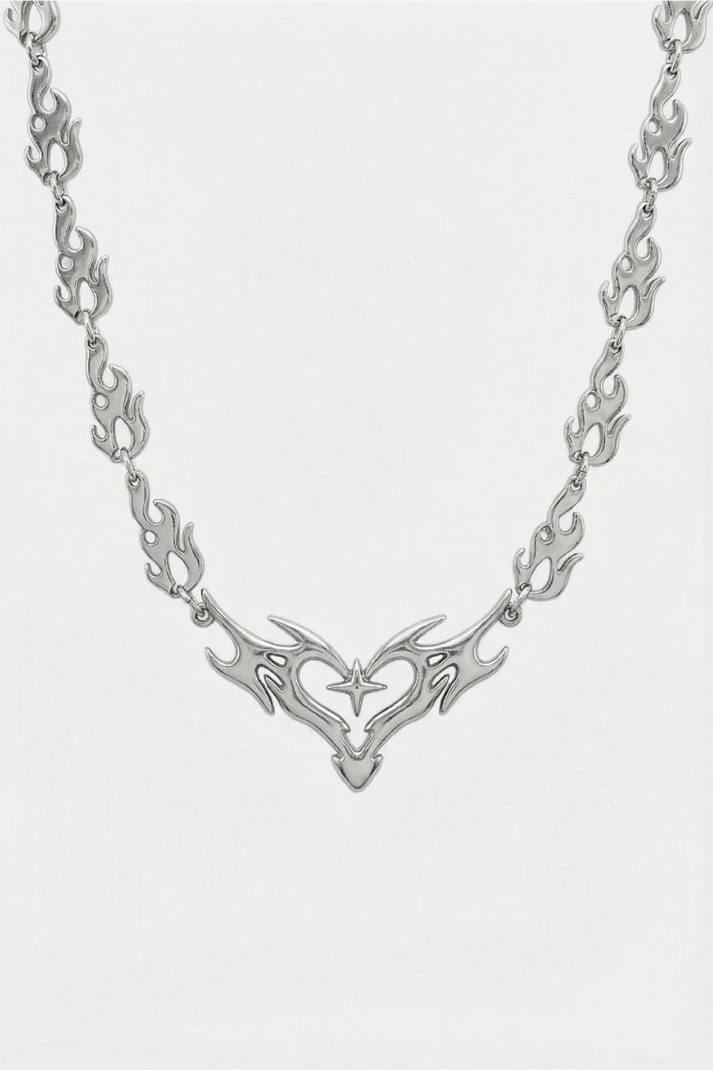 Tribal Necklace - metal pendant with radiating tribal linework, front view