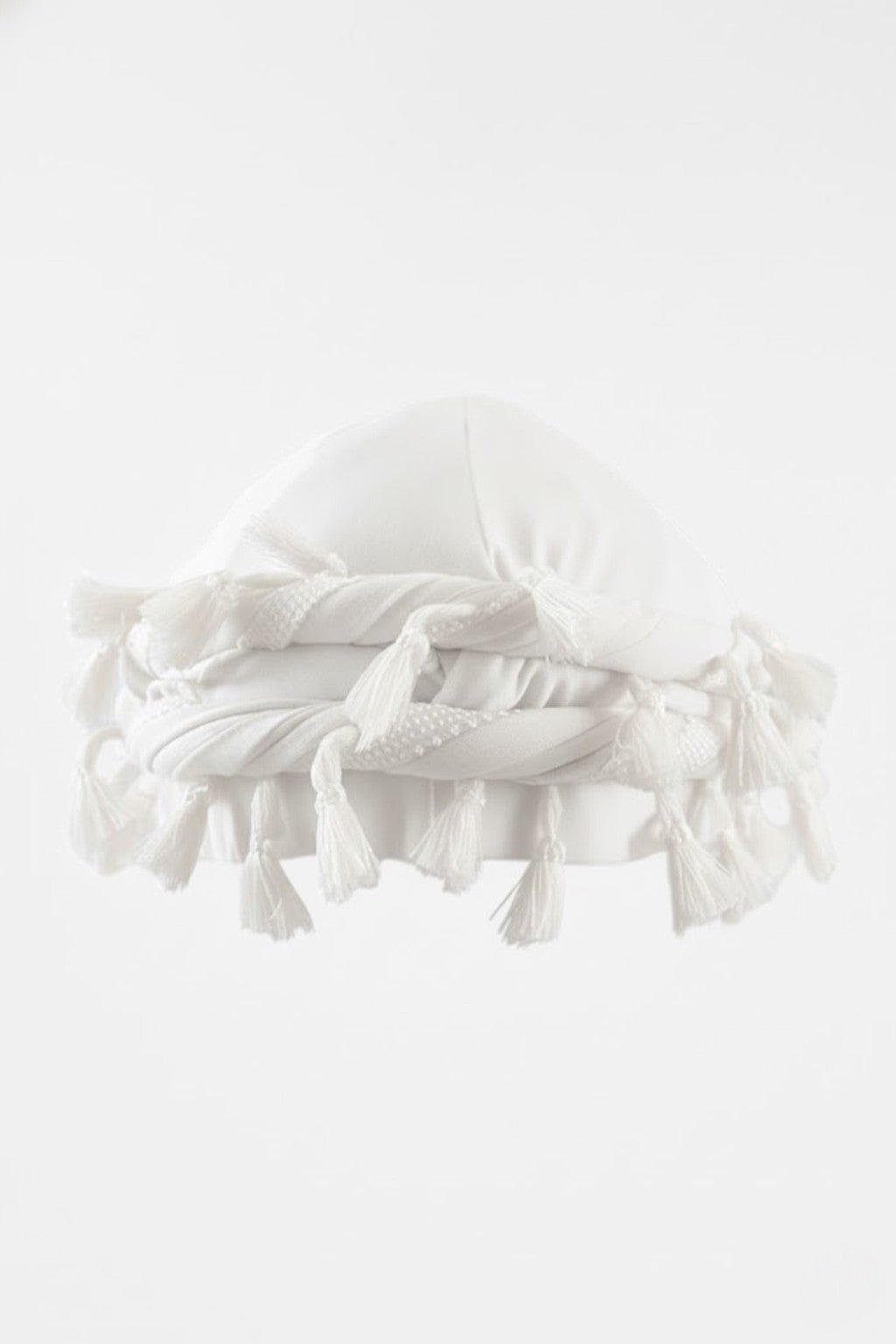 Turban Beanie - white turban style wrap with tassel fringe, front view